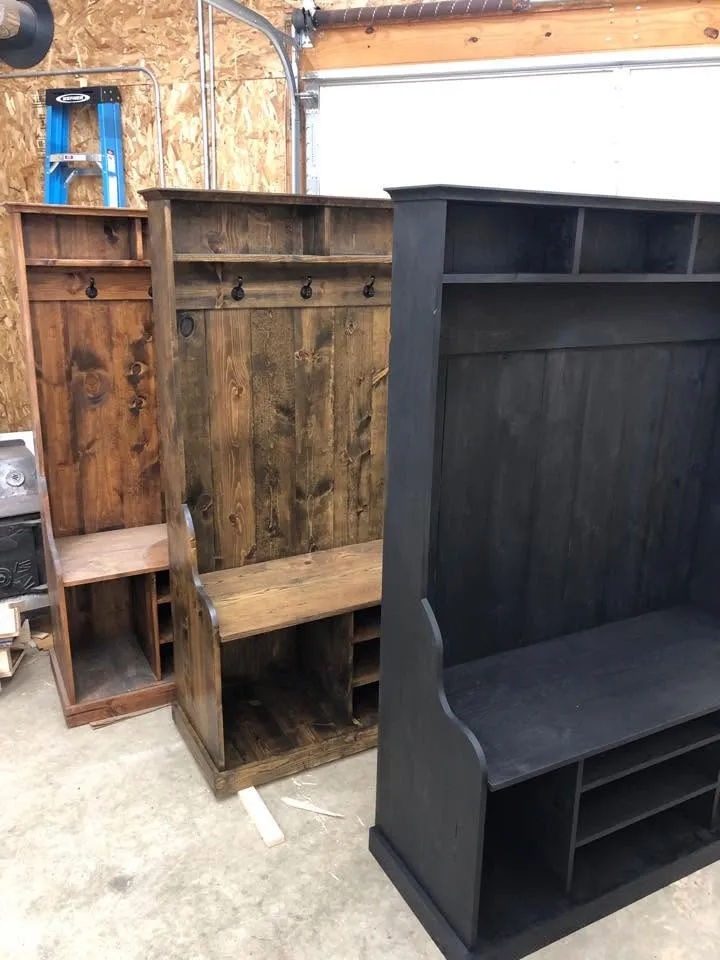 Trio of hall tree entryway lockers in walnut, brown, and black finishes