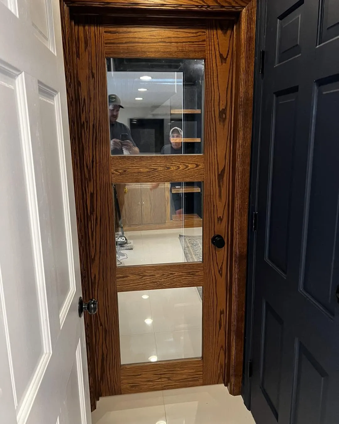 Oak interior door with three stacked glass lites